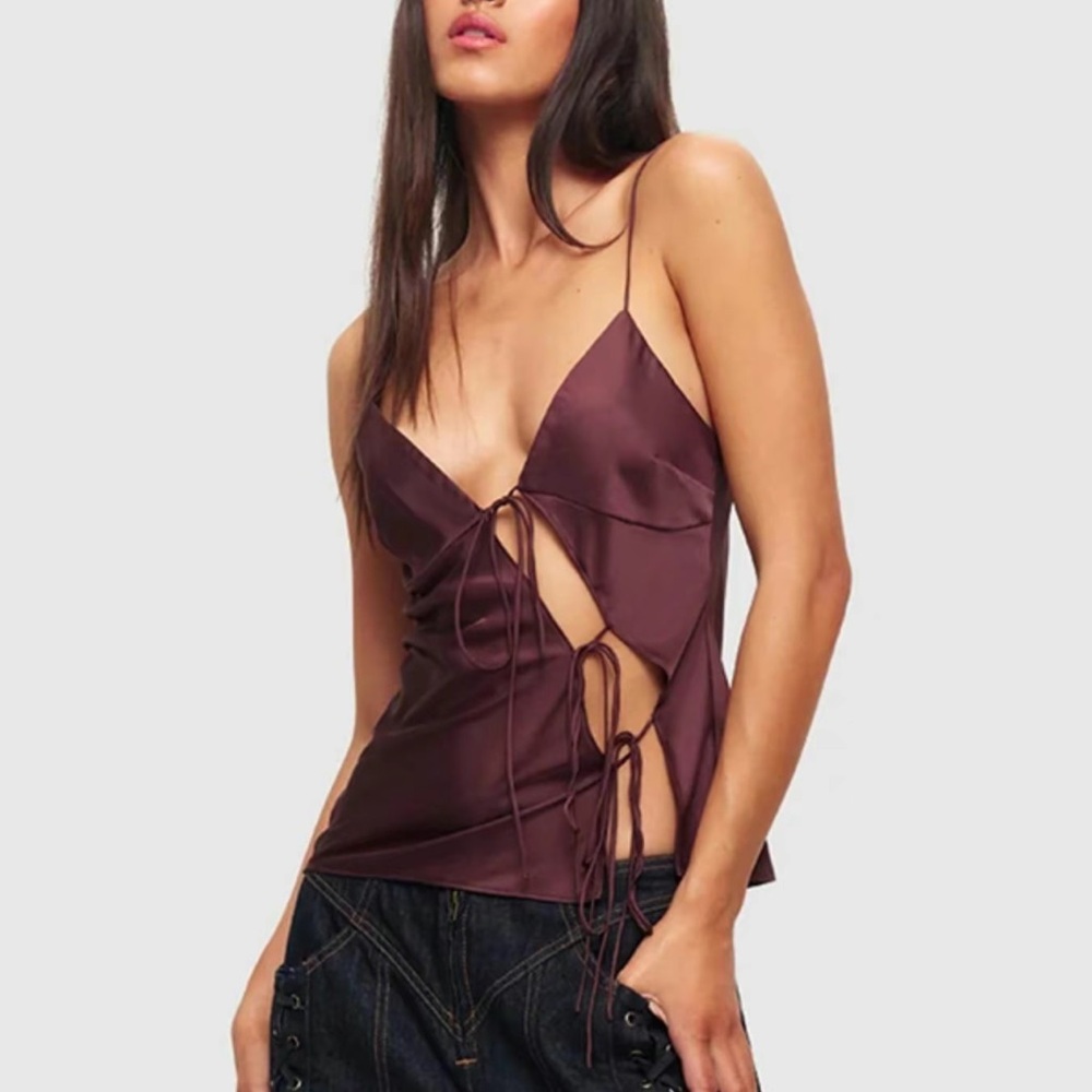 Red sleeveless camisole with plunge neckline and tie front